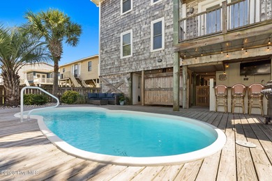 Beautifully updated coastal retreat just steps from the beach