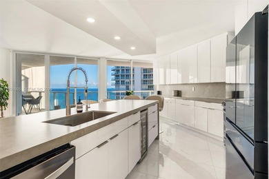 Designer-renovated 2BD + den / 2BA corner residence offering 1