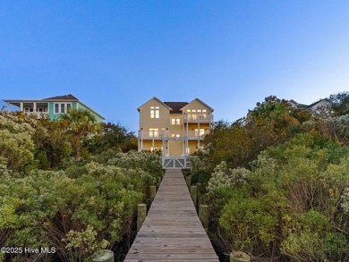 Welcome to this exquisite custom-built soundfront home in