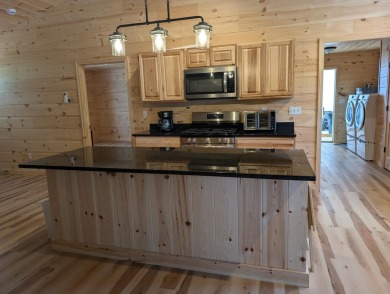 Welcome to your perfect Up North retreat! This beautifully