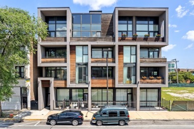 This modern 3-bedroom, 2-bath condo in a newer boutique building