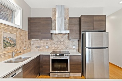This modern 3-bedroom, 2-bath condo in a newer boutique building