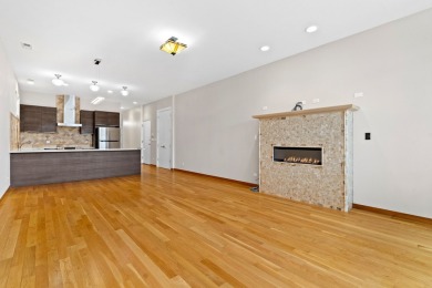 This modern 3-bedroom, 2-bath condo in a newer boutique building