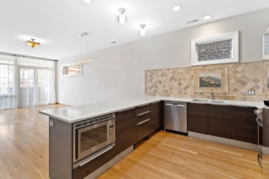 This modern 3-bedroom, 2-bath condo in a newer boutique building