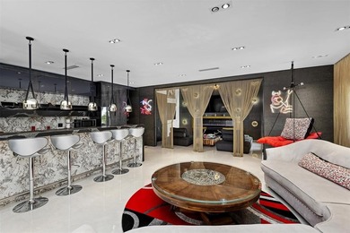 Indulge in luxurious coastal living at this elegantly-remodeled