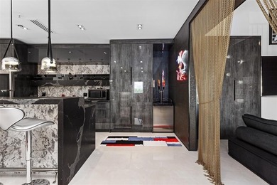 Indulge in luxurious coastal living at this elegantly-remodeled