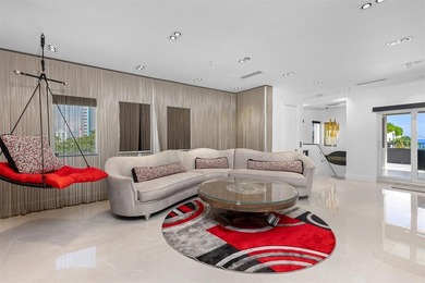 Indulge in luxurious coastal living at this elegantly-remodeled