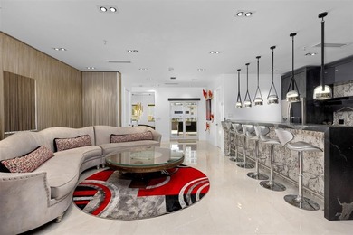 Indulge in luxurious coastal living at this elegantly-remodeled