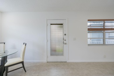 Second-floor 2 bed / 2 bath condo with garden views in the