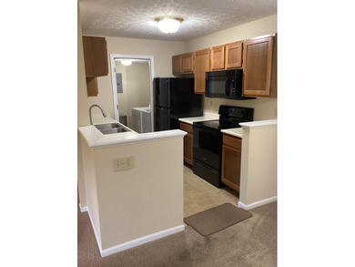 Don't miss this ground floor, well maintained condo with a