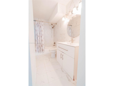 MOTIVATED SELLER! Beautifully updated high-floor 1BD/1.5BA condo