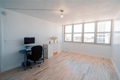 MOTIVATED SELLER! Beautifully updated high-floor 1BD/1.5BA condo