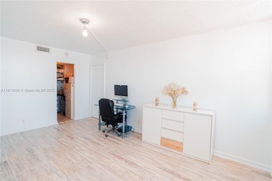 MOTIVATED SELLER! Beautifully updated high-floor 1BD/1.5BA condo
