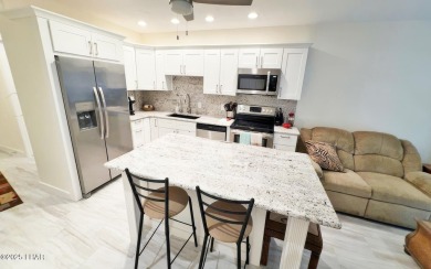 This luxurious top-floor Lake View condo offers breathtaking