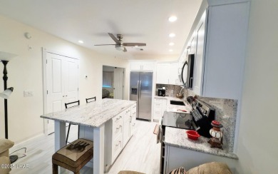 This luxurious top-floor Lake View condo offers breathtaking