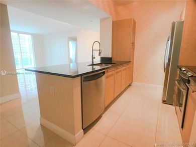 Gorgeous and spacious 2 bed 2 bath condo. High end building at