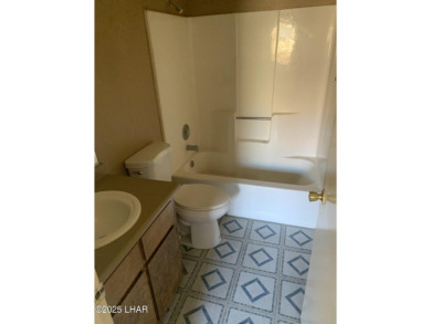 OWNER WILL CARRY. THIS 2BR.CONDO HAS A 1 CAR GARAGE. SOLD AS-IS