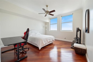 Welcome to the highest 2-bedroom unit in The Palms! Perched on