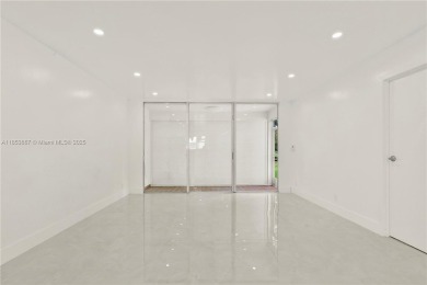 Discover this beautifully updated first-floor condo in the