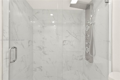 Discover this beautifully updated first-floor condo in the