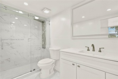 Discover this beautifully updated first-floor condo in the