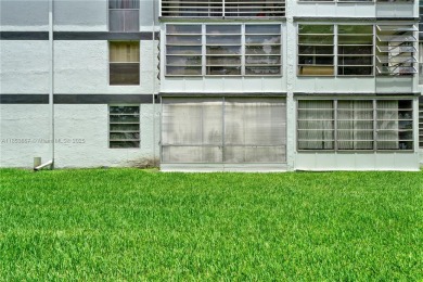 Discover this beautifully updated first-floor condo in the