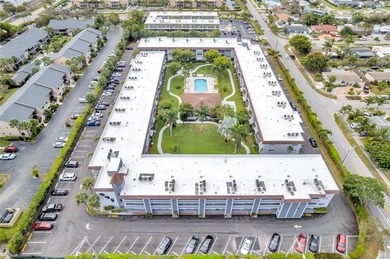 LOVELY, bright and cheerful, second floor garden view unit in