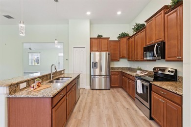 This spacious 4-bedroom, 3-bath home is located in the desirable