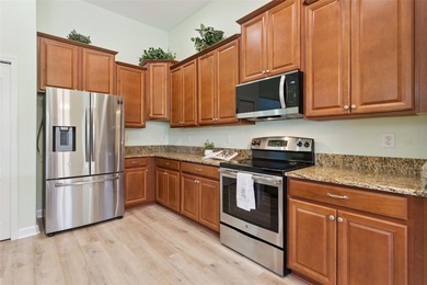 This spacious 4-bedroom, 3-bath home is located in the desirable