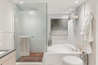 STUNNING one-of-a-kind 3BR/4.5BA residence, nearly fully