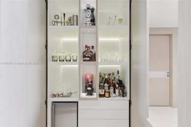 STUNNING one-of-a-kind 3BR/4.5BA residence, nearly fully