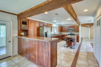 This charming 3 bedroom/2.5 bath home on Lake LBJ is a must see