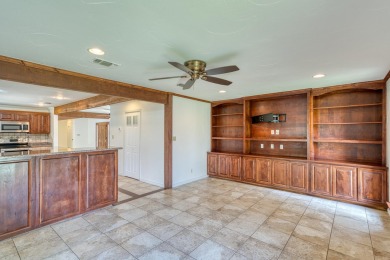 This charming 3 bedroom/2.5 bath home on Lake LBJ is a must see