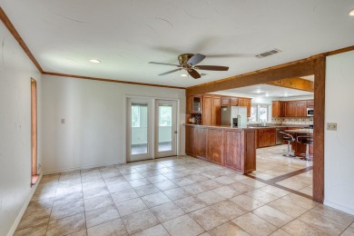 This charming 3 bedroom/2.5 bath home on Lake LBJ is a must see