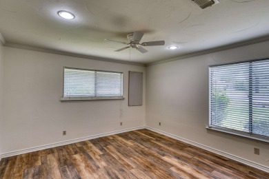 This charming 3 bedroom/2.5 bath home on Lake LBJ is a must see