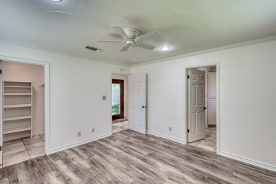 This charming 3 bedroom/2.5 bath home on Lake LBJ is a must see