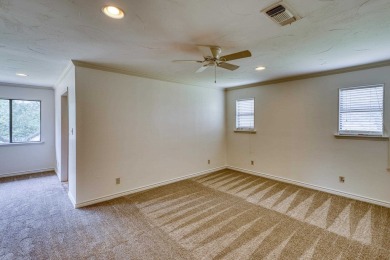 This charming 3 bedroom/2.5 bath home on Lake LBJ is a must see