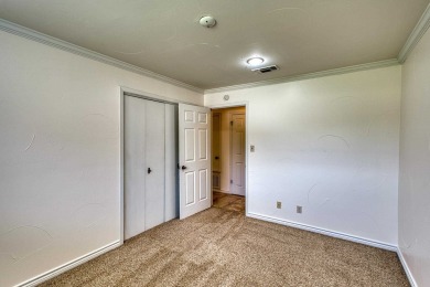 This charming 3 bedroom/2.5 bath home on Lake LBJ is a must see