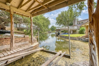 This charming 3 bedroom/2.5 bath home on Lake LBJ is a must see