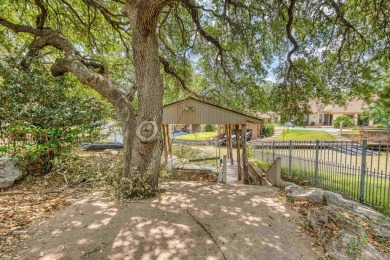 This charming 3 bedroom/2.5 bath home on Lake LBJ is a must see