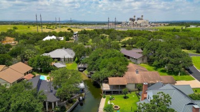 This charming 3 bedroom/2.5 bath home on Lake LBJ is a must see