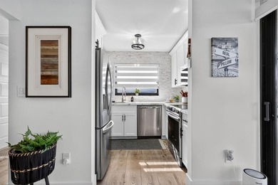 Stunning fully remodeled 2BR/2BA top-floor corner unit, 1,187 sq