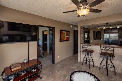 Desirable View Condo at Queensbay! This stunning lake-view condo