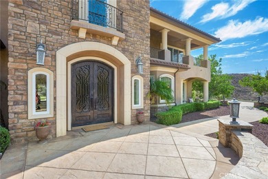 A PRIVATE HILLTOP MEDITERRANEAN/TUSCAN-STYLE LUXURY ESTATE