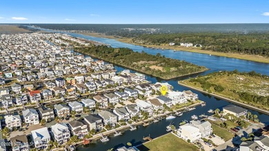 This beautifully custom-built 5-bedroom, 4.5-bath deep water