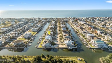 This beautifully custom-built 5-bedroom, 4.5-bath deep water