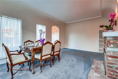 Welcome to this beautifully renovated Spanish-style home