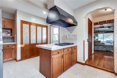 Welcome to this beautifully renovated Spanish-style home