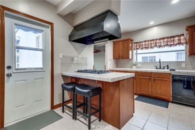 Welcome to this beautifully renovated Spanish-style home