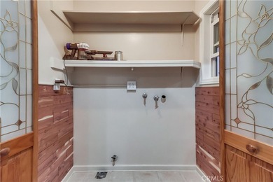 Welcome to this beautifully renovated Spanish-style home